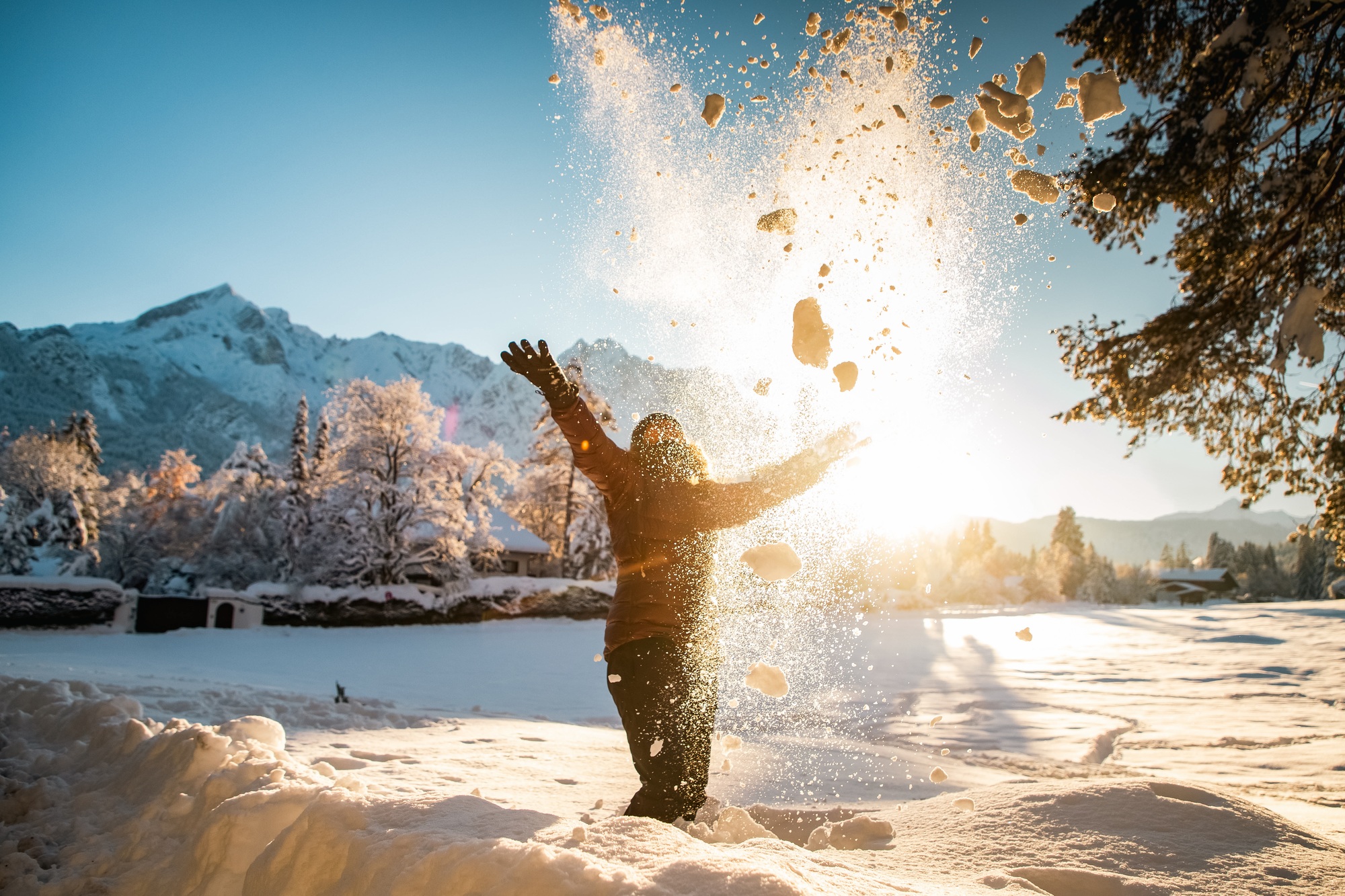woman having fun in winter snow